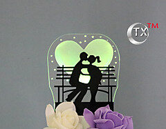 Cake topper LED -Young couple  kissing on bench